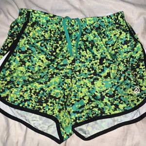 green and black sport shorts